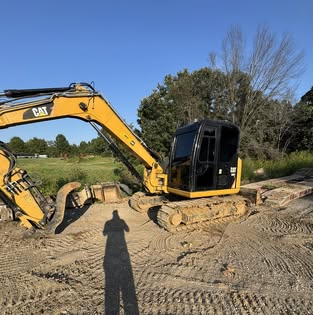 Caterpillar excavator with tinted cab windows